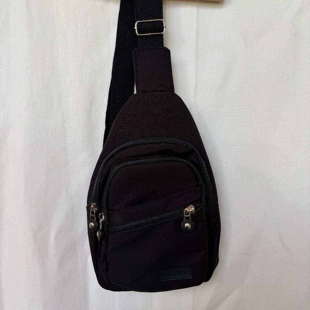 Black sling pack